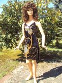 Robe &agrave; paillettes noires et dor&eacute;e