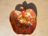 Pomme brillante dor&eacute;e et rouge